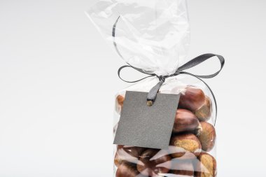 Elegant bag of chestnuts with blank label and copy space