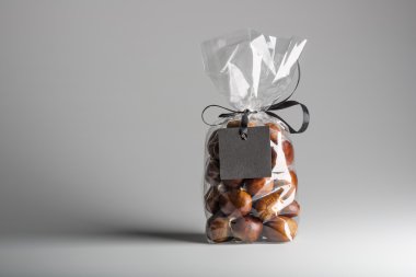 Bag of chestnuts with black blank label and copy space