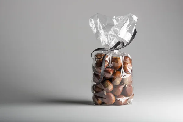 Elegant gift of fresh chestnuts with copy space