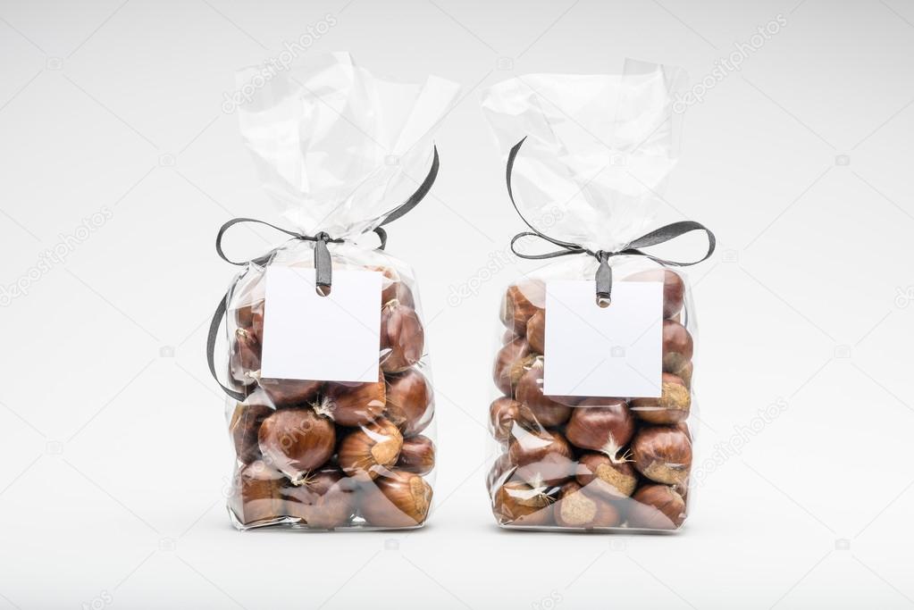 Two elegant plastic bags of sweet chestnuts for gift