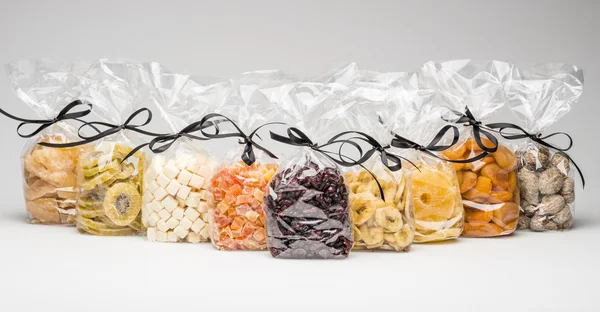 Organic dried fruits collection into luxury transparent plastic — Stock Photo, Image