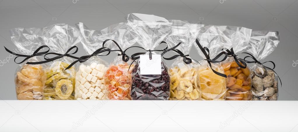 Mixed dried fruits collection into elegant plastic bags