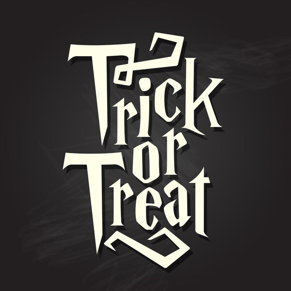 Trick or treat halloween quote on chalkboard