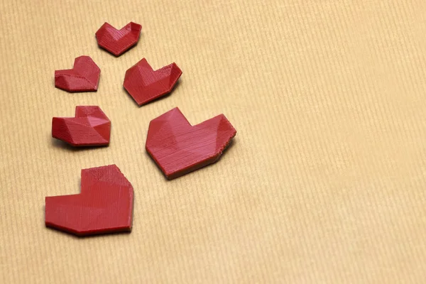 3d printed heart's on pack paper — Stock Photo, Image