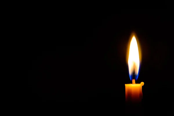 Světlo svíčky ve tmě — Stock fotografie