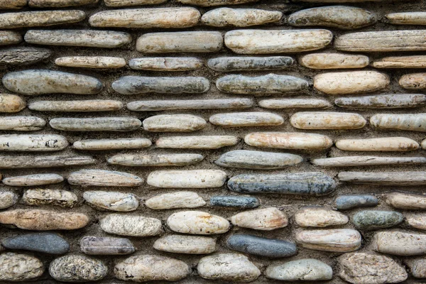 Stone wall surface with cement — Stock Photo, Image