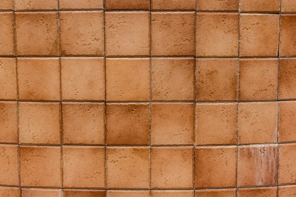 Brown ceramic wall tiles and details of surface — Stock Photo, Image