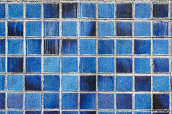 Blue ceramic wall tiles and details of surface — Stock Photo, Image