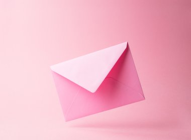 Pink envelope dropped over pink