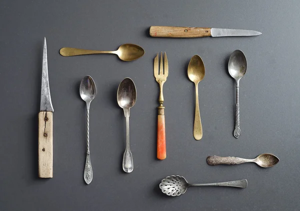 Collection of vintage golden cutlery — Stock Photo, Image