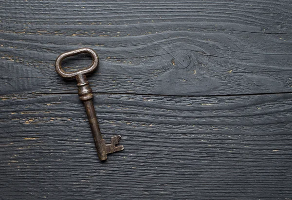 Vintage Key over wooden tabl — Stock Photo, Image