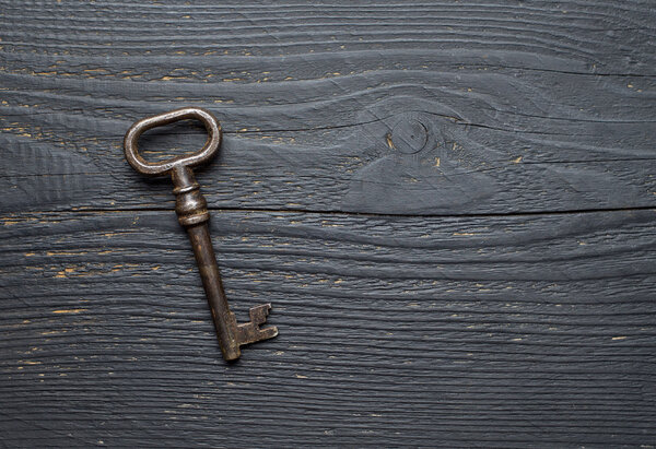 Vintage Key over wooden tabl