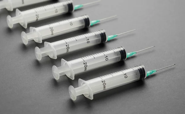 Syringes organized in a row — Stock Photo, Image
