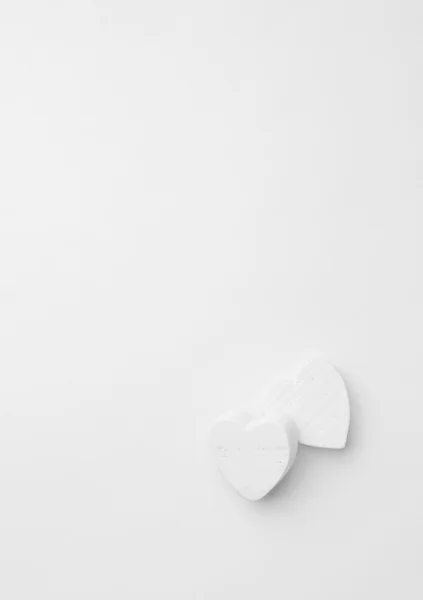 Wooden hearts over white — Stock Photo, Image