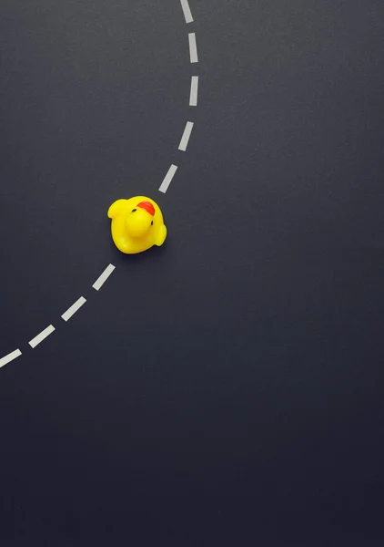 The path of a yellow rubber duck — Stock Photo, Image