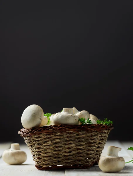 Champignon mushrooms in basket — Stock Photo, Image