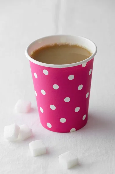 Coffee in a pink paper cup — Stock Photo, Image