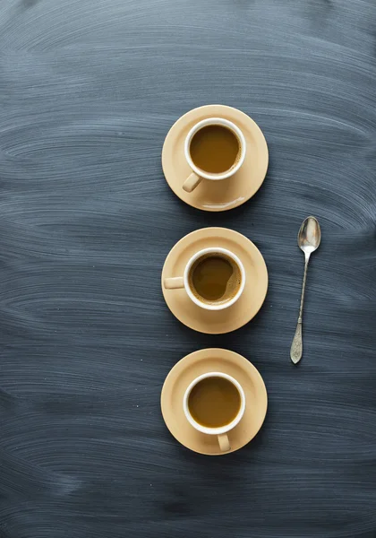 Coffee cups  and a spoon — Stock Photo, Image