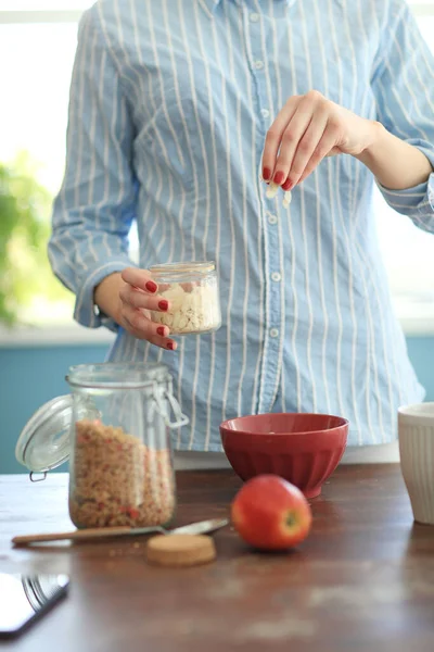 Breakfast. Lovely girl at the kitchen in the morning