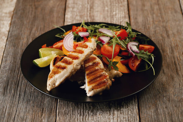 Food. Grilled chicken breast with vegetables