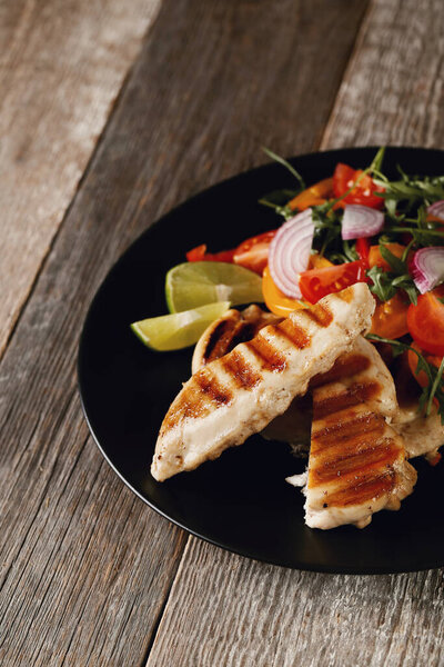 Food. Grilled chicken breast with vegetables