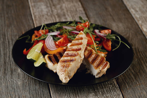 Food. Grilled chicken breast with vegetables