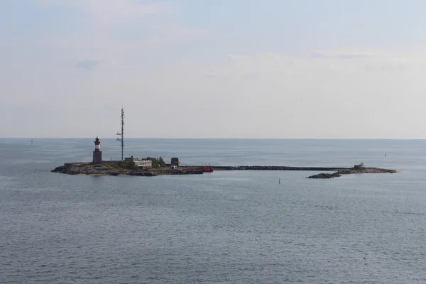 Ein Leuchtturm auf der Insel. Finnland. — Stockfoto