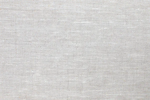 texture of natural linen fabric of gray color close-up. the background for your mockup