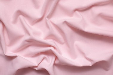 Buruşuk, buruşuk, doğal pembe pamuk kumaş dokusu. Model için arkaplan
