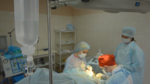 Surgeons operated patient team — Stock Video