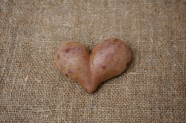 Las patatas en forma del corazón al saquear — Foto de Stock