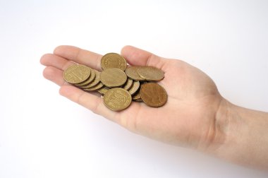 bir avuç paraları bir hryvni holding beyaz bir arka plan üzerinde el