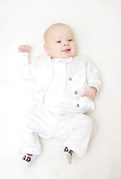 Baby boy in a white tuxedo and bow tie — Stock Photo, Image