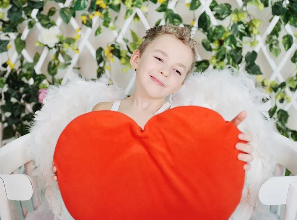 Baby cupid with heart — Stock Photo, Image