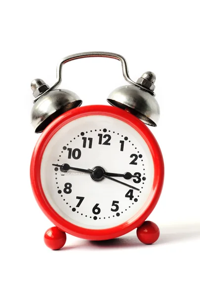 Kırmızı alarm clock beyaz kadranı ile — Stok fotoğraf