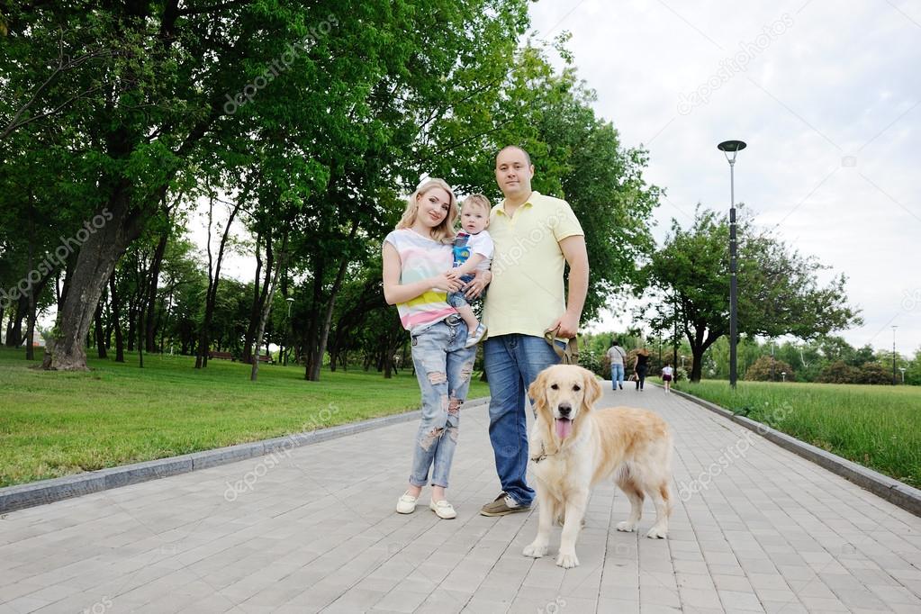 family with a dog retriever