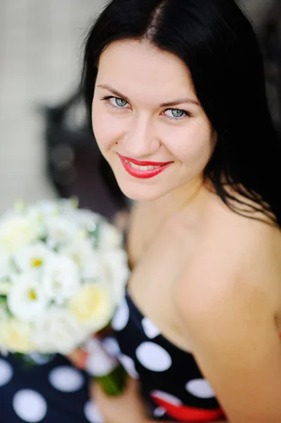 Bridesmaid with wedding bouquet — Stock Photo, Image