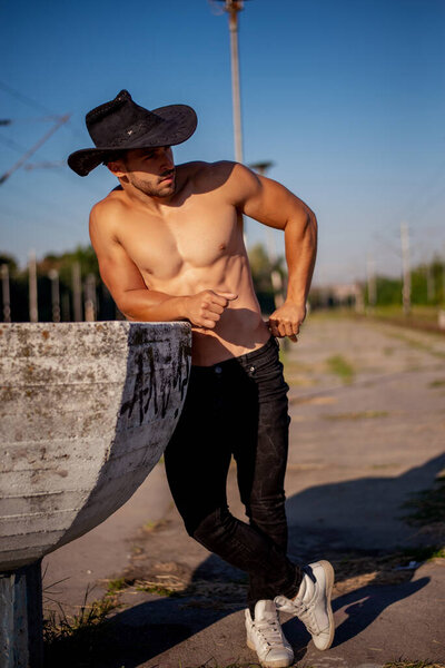 Handsome bearded macho man. Men beauty standard. Example of true masculinity.  Western life.