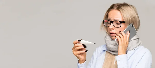 Sick Young Woman Glasses Caught Cold Looking Thermometer Talking Mobile — Stock Photo, Image