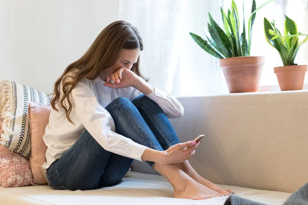 Crying Young Woman Depression Looking Phone Gets Bad News Covering — Stockfoto