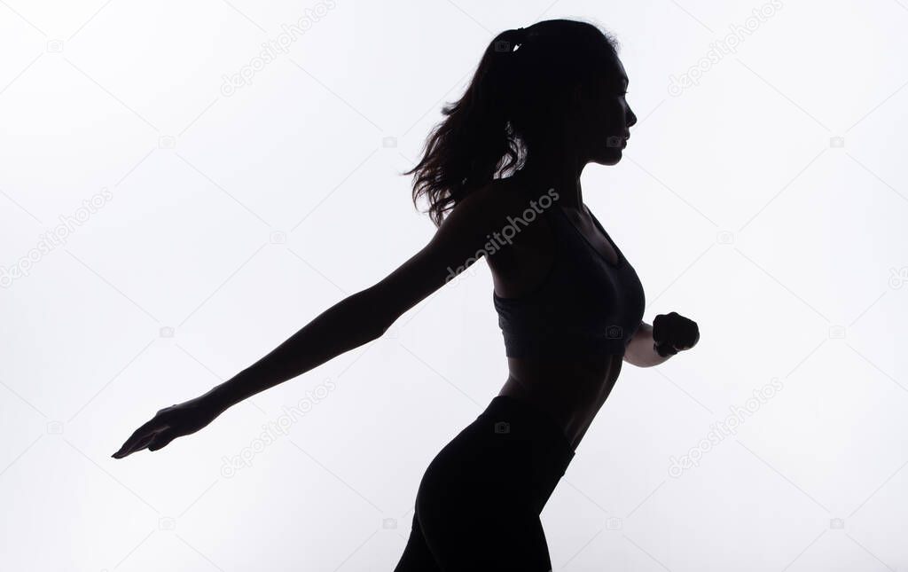 Silhouette body of Young Fitness Woman play sweat Yoga and stretch muscle for slim sexy shape. High contrast white background copy space