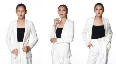 20 'li yaşlardaki Asyalı kadının yarı vücut portresi. Siyah saçlı, beyaz takım elbiseli. Yüzündeki duyguları ifade eden kız, beyaz arka planda izole edilmiş bir profil üzerinde birçok poz verir.