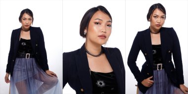 20 'li yaşlarda, Asyalı bir kadının yarı vücut portresi. Siyah saçlı, beyaz ceketli. Beyaz arka planda mor etekle moda pozları veren bir kız.