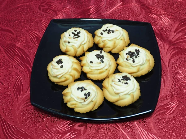 Cookies with cream and chocolate chips. Russian traditional cuisine. Bakery products. Cooking.