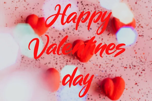Happy valentines day text on blurry Pink Background with Hearts. — Stock Photo, Image