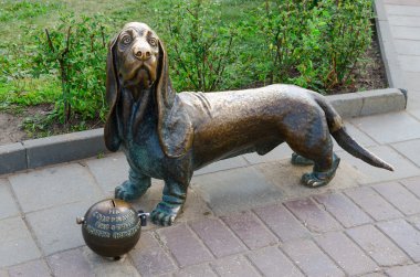 Monument  Fire dog Bobka on Susaninskaya square, Kostroma, Russia clipart