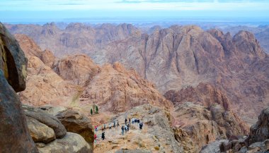 Tourists descend from the top of Mount Moses, Mount Sinai, Egypt clipart