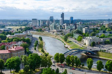 Vilnius, view of river Neris and City high-rise buildings on right bank
