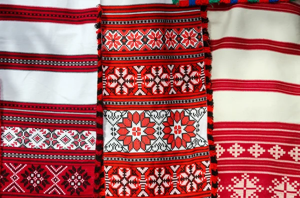 Three belorussian woven towel with multicolored geometric patterns — Stock Photo, Image