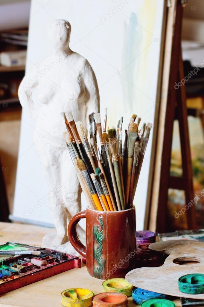 Artistic equipment in Paint, brushes, art palette, easel